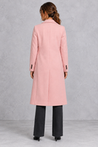 Women's double-breasted longline coat in Pink – back view