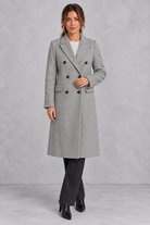 Women's double-breasted longline coat in Grey – front view