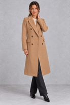 Women's double-breasted longline coat in Camel – front view