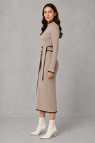 Women’s elegant draped bodycon knit midi dress with a fitted silhouette and softly gathered detailing, ideal for smart-casual and evening wear.
