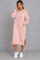 Women's pink hooded sweatshirt midi dress with side split – front view
