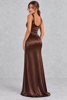 Women’s elegant V-neck bodycon maxi dress with a sleeveless design, fitted silhouette and sophisticated split hem.