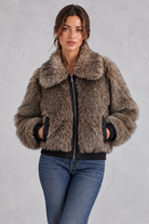 Women's faux fur bomber jacket in Brown – front view
