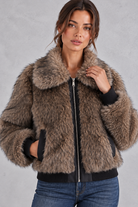 Women's faux fur bomber jacket in Brown – close-up view
