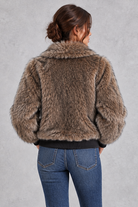 Women's faux fur bomber jacket in Brown – back view