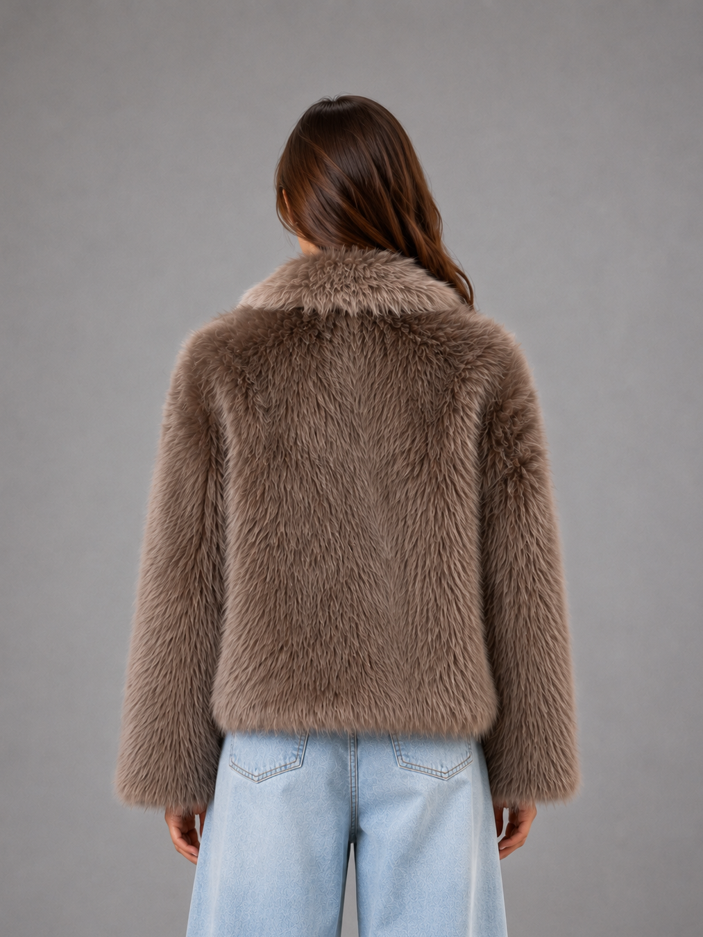 Women’s oversized faux fur coat with a soft plush texture, statement collar and relaxed silhouette for elegant autumn and winter styling.