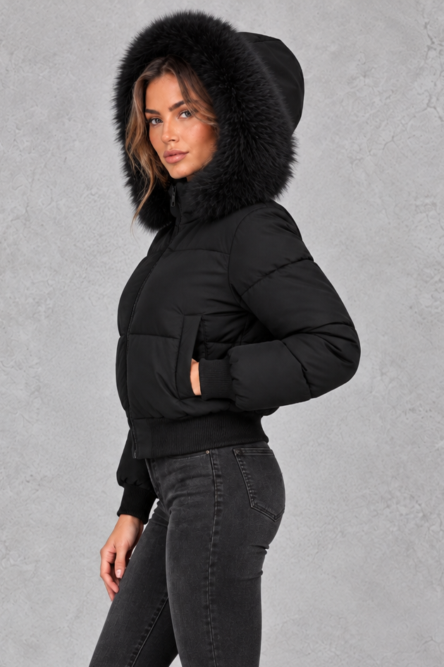 Women’s padded puffer jacket with a plush faux fur collar, full zip front, long sleeves and elasticated cuffs and hem.