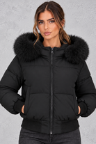 Women’s padded puffer jacket with a plush faux fur collar, full zip front, long sleeves and elasticated cuffs and hem.