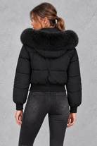 Women’s padded puffer jacket with a plush faux fur collar, full zip front, long sleeves and elasticated cuffs and hem.