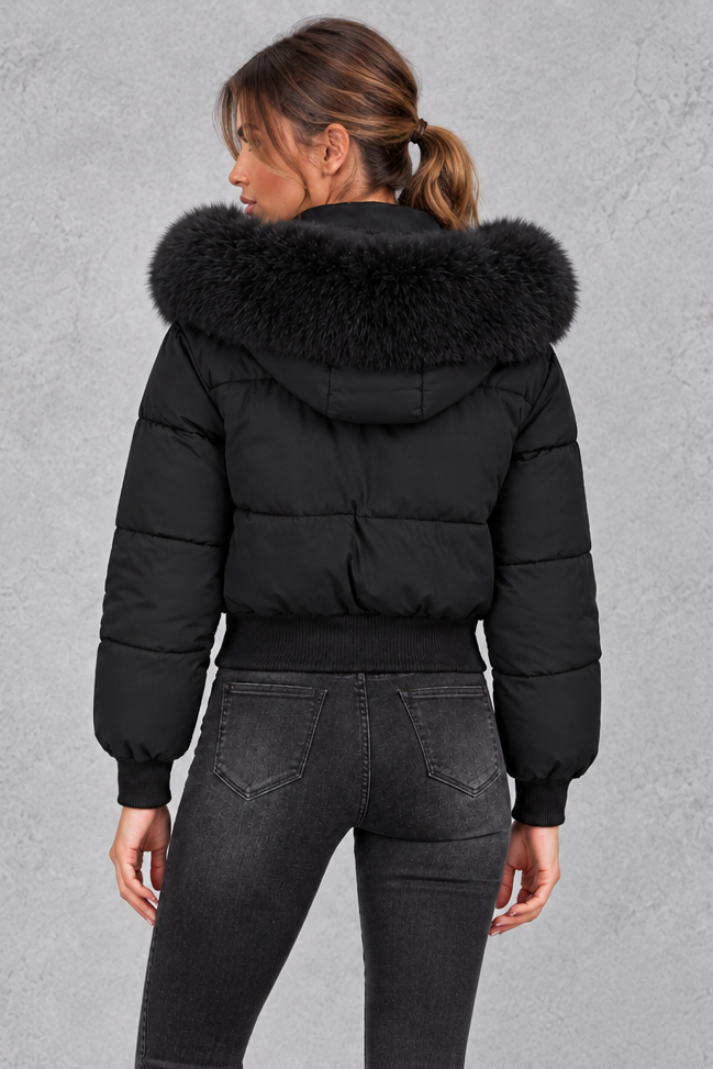 Women’s padded puffer jacket with a plush faux fur collar, full zip front, long sleeves and elasticated cuffs and hem.