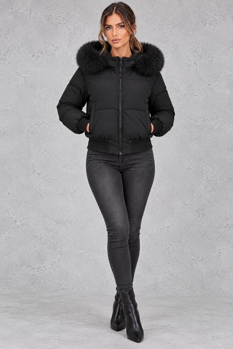 Women’s padded puffer jacket with a plush faux fur collar, full zip front, long sleeves and elasticated cuffs and hem.