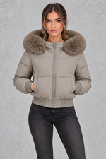 Women’s padded puffer jacket with a plush faux fur collar, full zip front, long sleeves and elasticated cuffs and hem.