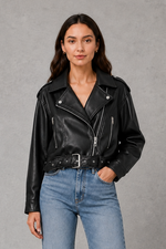 Women’s faux leather biker jacket with an asymmetric zip front, adjustable belted waist, zipped pockets and a relaxed cropped moto silhouette.