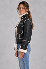 Women’s cropped aviator jacket with an oversized faux shearling collar, plush lining, flap chest pockets and adjustable drawcord hem.