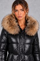 Women's fitted puffer jacket with faux fur hood in Black – close-up