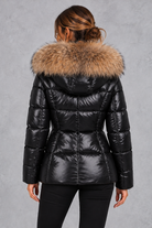 Women's fitted puffer jacket with faux fur hood in Black – back view