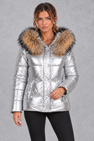 Women's fitted puffer jacket with faux fur hood in Silver – front view
