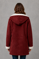 Women’s fleece-lined winter coat with a soft cosy interior, flattering feminine silhouette and elegant design for everyday cold-weather wear.