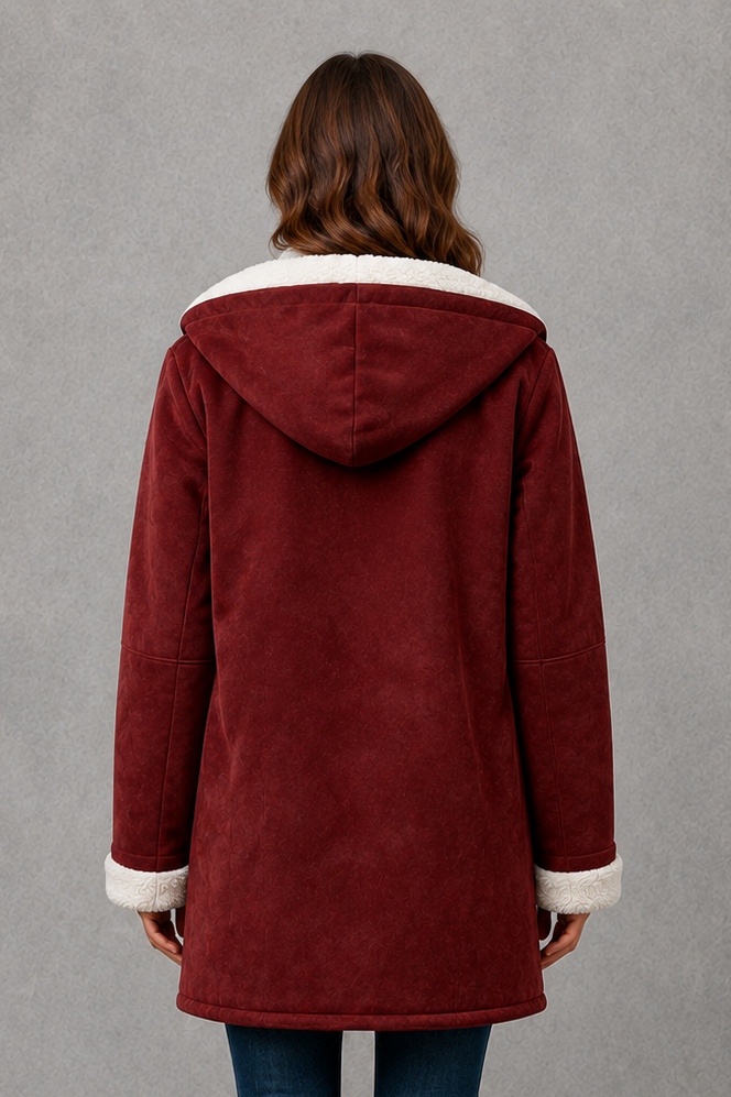Women’s fleece-lined winter coat with a soft cosy interior, flattering feminine silhouette and elegant design for everyday cold-weather wear.