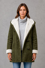 Women’s fleece-lined winter coat with a soft cosy interior, flattering feminine silhouette and elegant design for everyday cold-weather wear.