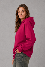 Women’s relaxed-fit fleece hoodie in a soft cotton and recycled polyester blend with long sleeves, ribbed cuffs and hem.