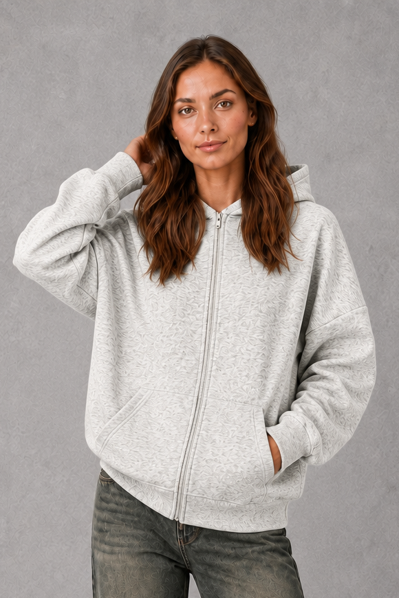 Women’s relaxed-fit fleece hoodie in a soft cotton and recycled polyester blend with long sleeves, ribbed cuffs and hem.