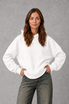 Women’s relaxed-fit fleece hoodie in a soft cotton and recycled polyester blend with long sleeves, ribbed cuffs and hem.