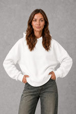 Women’s relaxed-fit fleece hoodie in a soft cotton and recycled polyester blend with long sleeves, ribbed cuffs and hem.