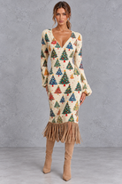 Women’s Christmas jumper dress with all-over Christmas tree print, V-neck and fringe hem