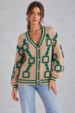 Women’s geometric knit cardigan with a deep V-neckline, button front, dropped shoulders and contrast striped ribbed trims.