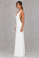 Women’s halter backless bodycon maxi dress with delicate spaghetti straps, gold ring detailing and a sleek fitted silhouette.