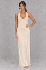 Women’s halter backless bodycon maxi dress with delicate spaghetti straps, gold ring detailing and a sleek fitted silhouette.