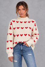 Women's cream heart pattern oversized mock neck jumper – front view