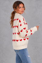 Women's cream heart pattern oversized mock neck jumper – side view