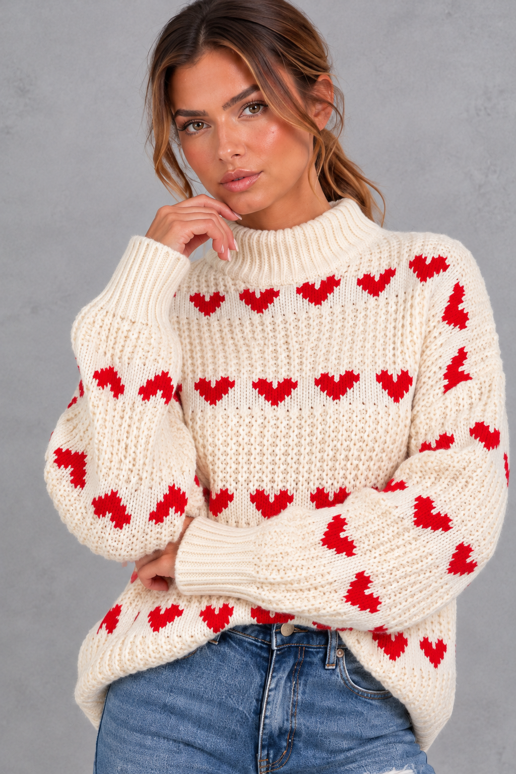 Women's cream heart pattern oversized mock neck jumper – close-up of the heart motif and mock neck