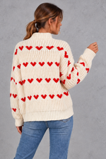 Women's cream heart pattern oversized mock neck jumper – back view