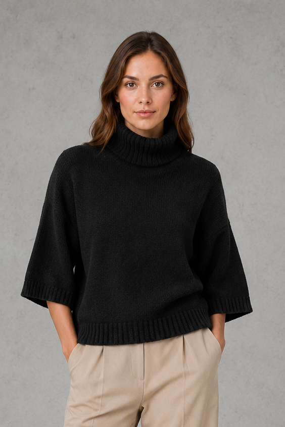 Women’s high neck batwing knit jumper with textured waist-cinching design for autumn and winter.