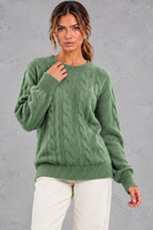 Women's green brushed cable knit crew neck jumper – front view
