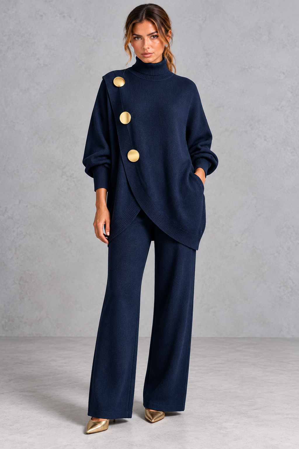 Women's navy blue knitted turtleneck jumper and wide leg trouser set with gold buttons – front view