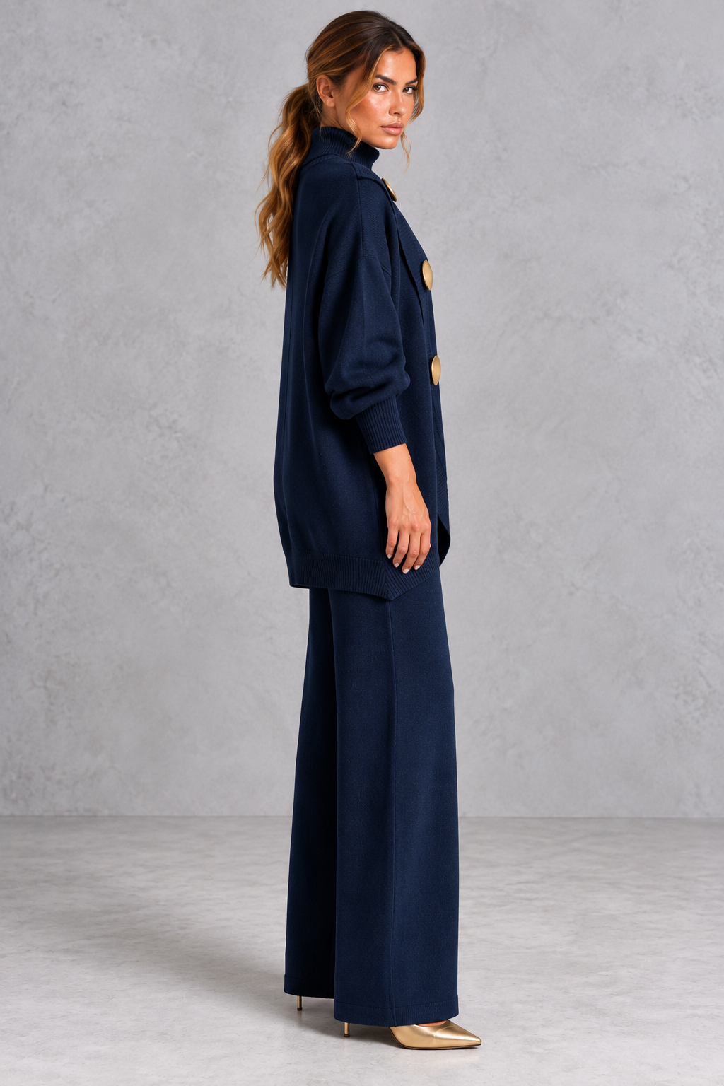 Women's navy blue knitted turtleneck jumper and wide leg trouser set – side view