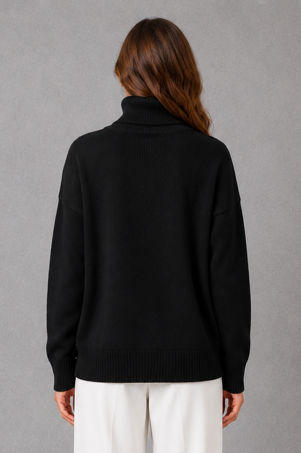 Women’s high neck knit jumper with a relaxed loose fit, cosy turtleneck, long sleeves and soft knitted finish for autumn and winter.