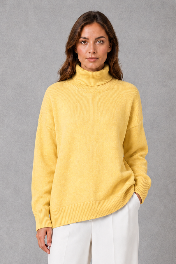 Women’s high neck knit jumper with a relaxed loose fit, cosy turtleneck, long sleeves and soft knitted finish for autumn and winter.