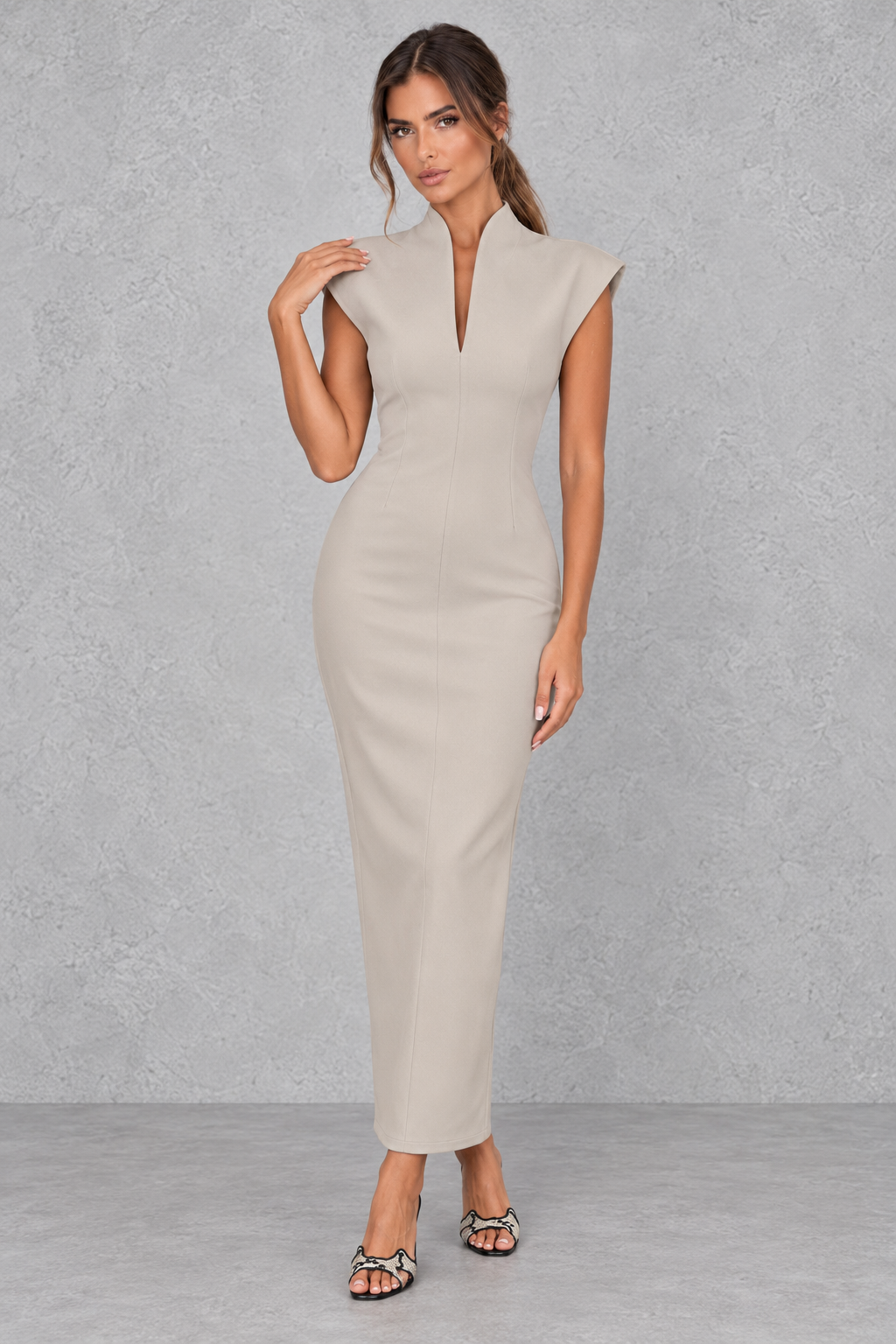 Women’s high V-neck sleeveless maxi dress with a sleek sheath silhouette, solid-colour finish and elegant streamlined design.