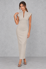 Women’s high V-neck sleeveless maxi dress with a sleek sheath silhouette, solid-colour finish and elegant streamlined design.