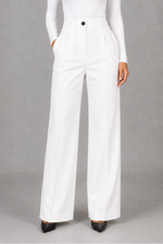Women’s high waisted tailored trousers with a classic straight leg, clean minimalist finish and elegant smart fit for work and everyday styling.