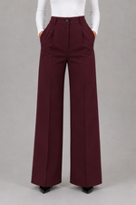 Women’s high waisted tailored trousers with a classic straight leg, clean minimalist finish and elegant smart fit for work and everyday styling.
