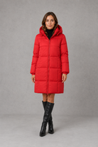 Women’s hooded puffer coat with lightweight insulated padding, structured hood and a flattering feminine silhouette for cold-weather wear.