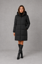 Women’s hooded puffer coat with lightweight insulated padding, structured hood and a flattering feminine silhouette for cold-weather wear.