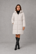 Women’s hooded puffer coat with lightweight insulated padding, structured hood and a flattering feminine silhouette for cold-weather wear.