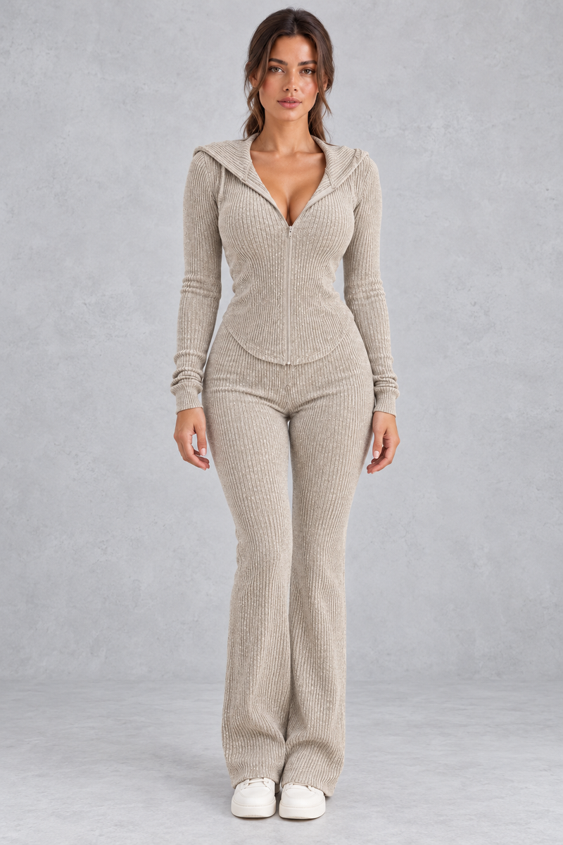 Women’s hooded ribbed knit co-ord set with a fitted zip-up top, long sleeves and matching flared trousers.